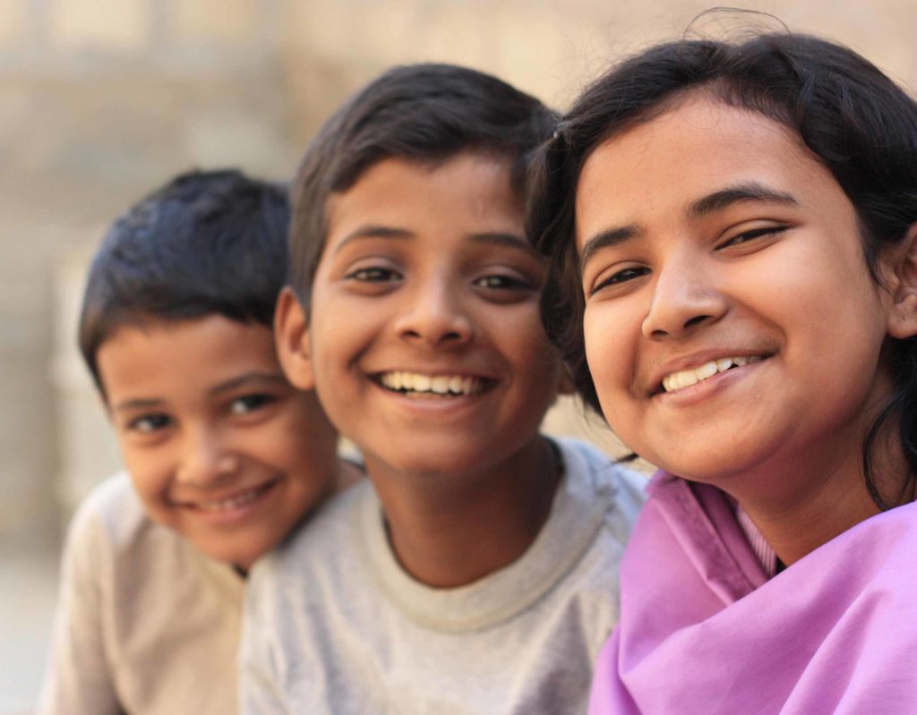 Three Smiling Kids