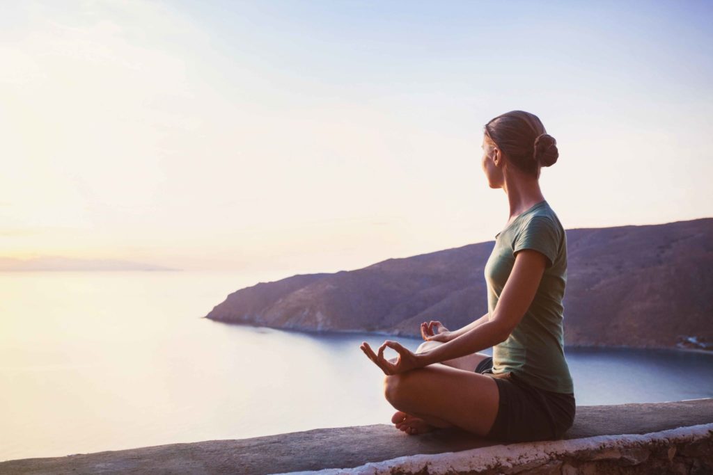 Woman Yoga Pose Looking At Ocean