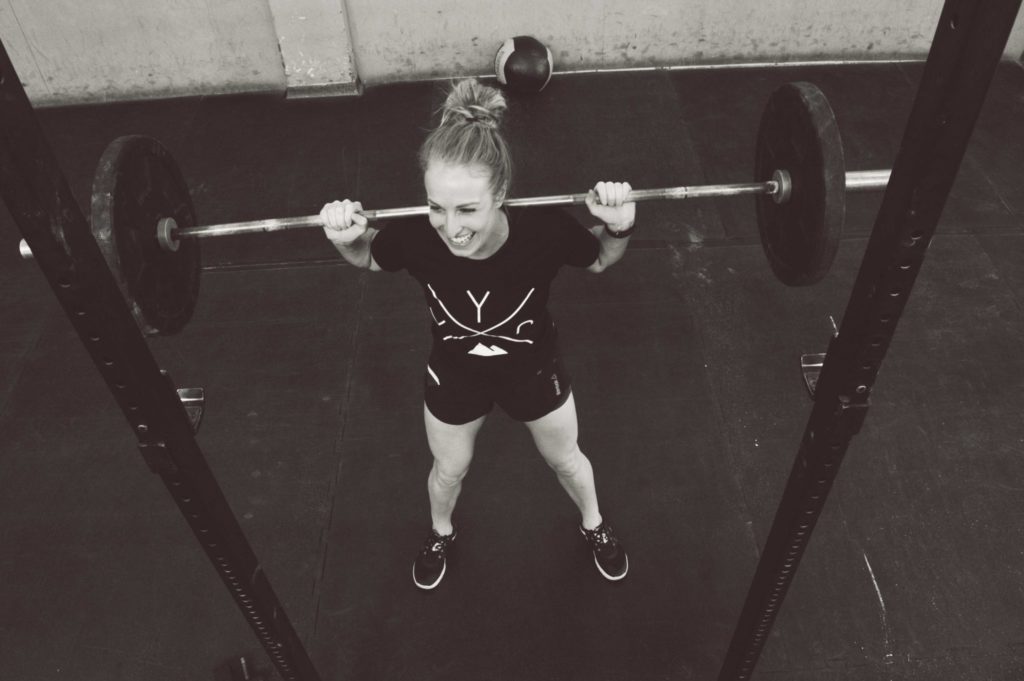 Woman Backsquat Happy