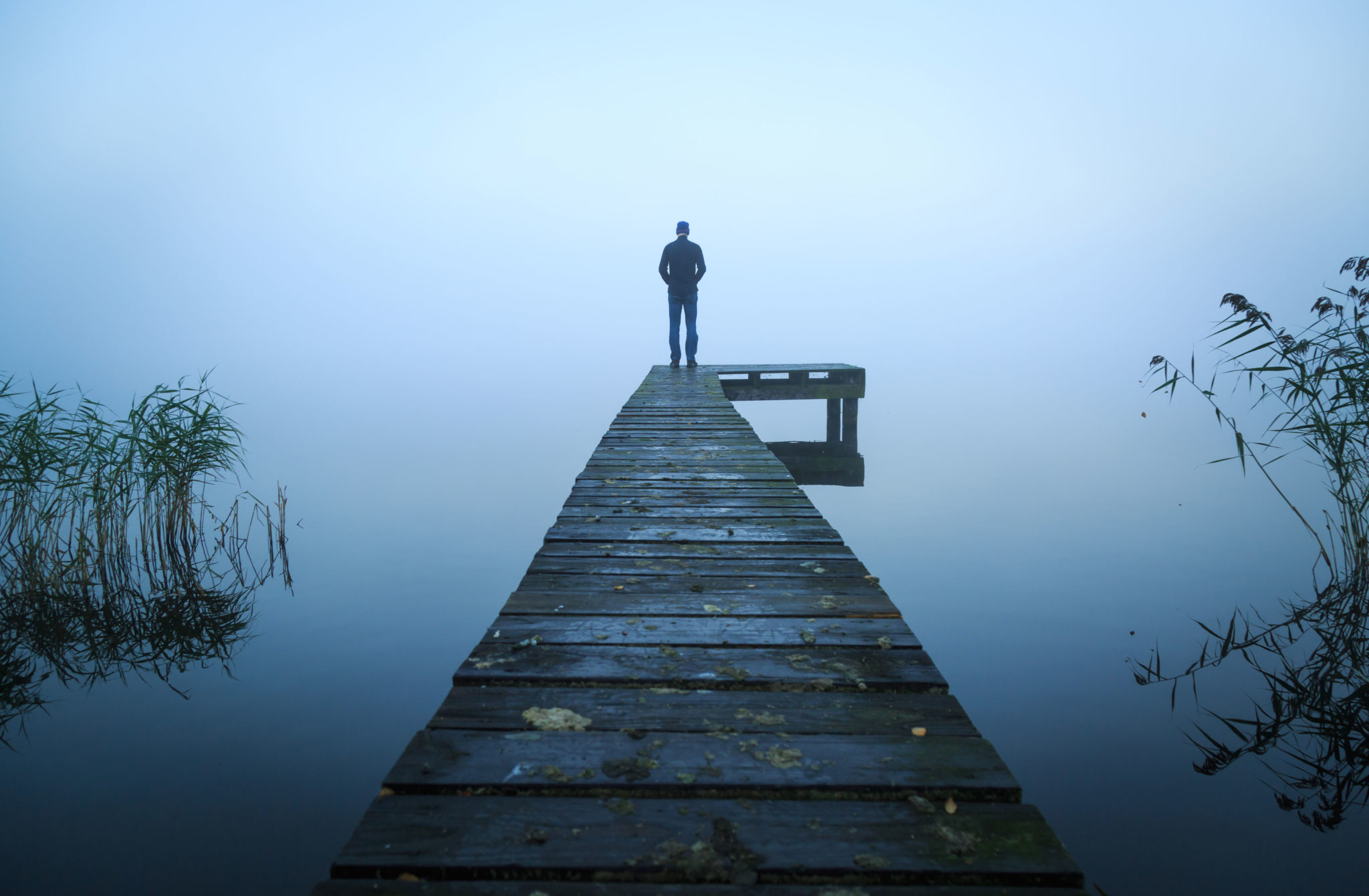 Lonely Man On Pier