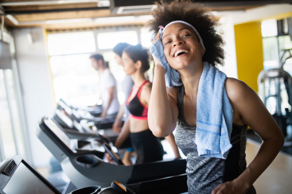 Smiling Attractive Woman Exercising