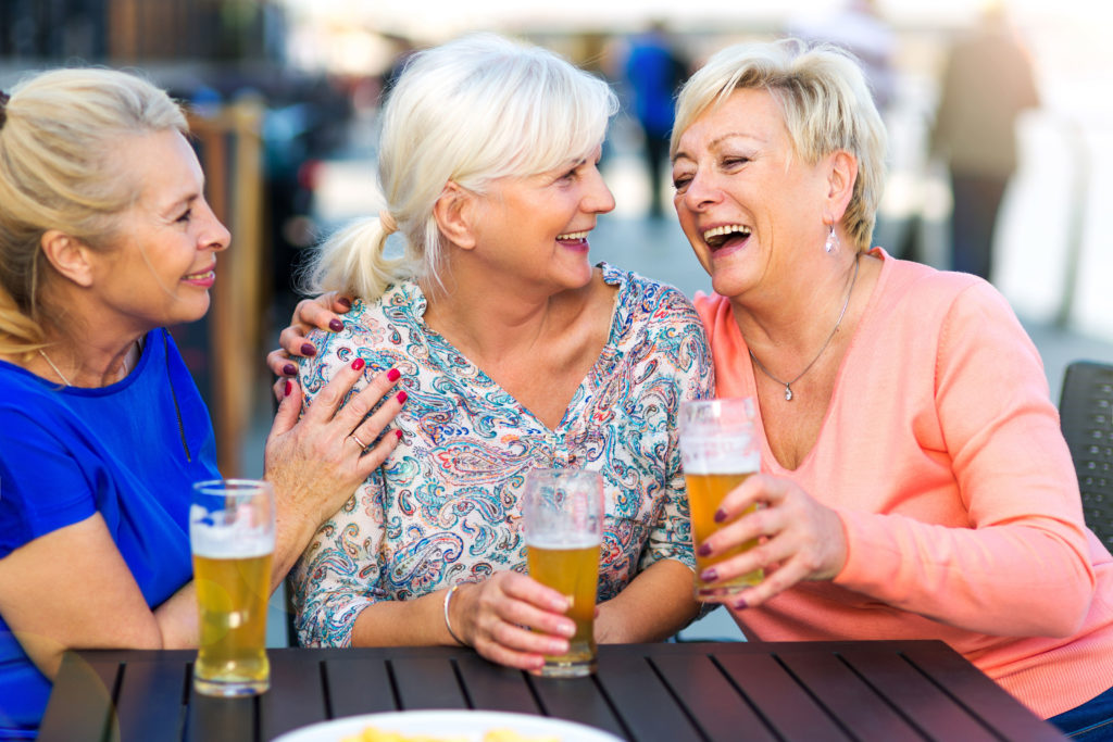 Beer as an anti-aging supplement. Women Enjoying Beer And Company
