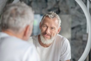 Old Guy Looking Into Mirror